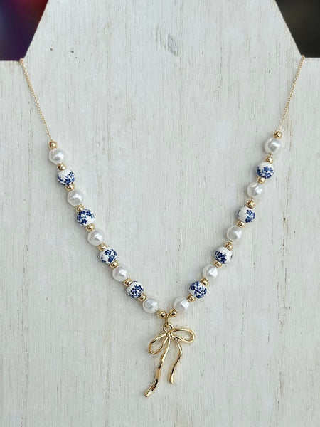 Blushing Bow Necklace - Blue