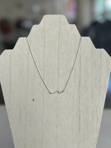 Short Metal Necklace Featuring Wave Pendant