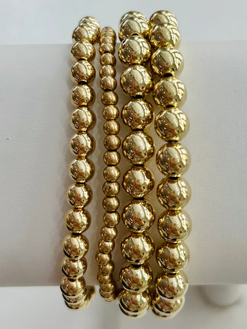 Set of Four Beaded Stretch Bracelets - Gold
