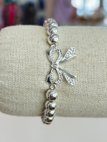 Beaded Stretch Bracelet With Bow Charm - Silver