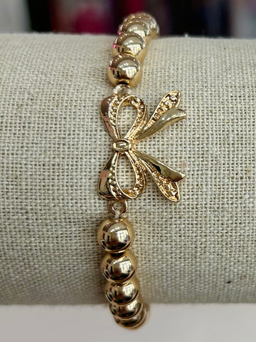 Beaded Stretch Bracelet With Bow Charm - Gold